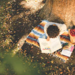 woman working on a blanket