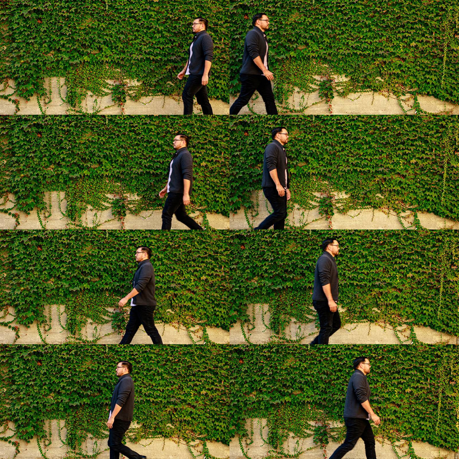 man walking past ivy